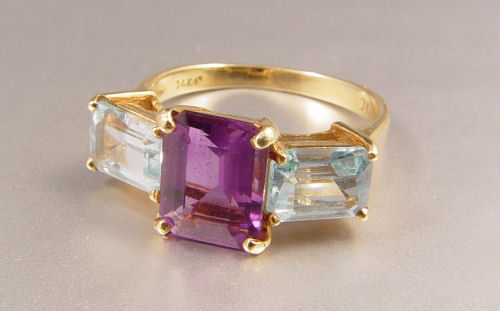 Appraisal: CT AMETHYST WITH BLUE TOPAZ RING K yellow gold ring