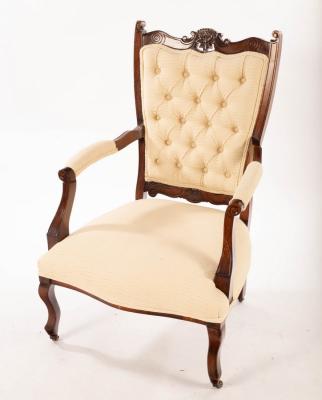 Appraisal: An Edwardian button back open armchair with upholstered back arms