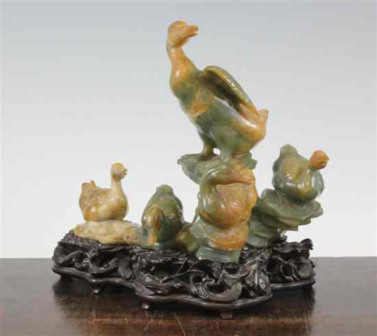 Appraisal: A Chinese green and russet jade group of five ducks