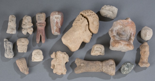 Appraisal: Assortment of Carved Pre-Columbian Figures Mostly depicting figural heads and