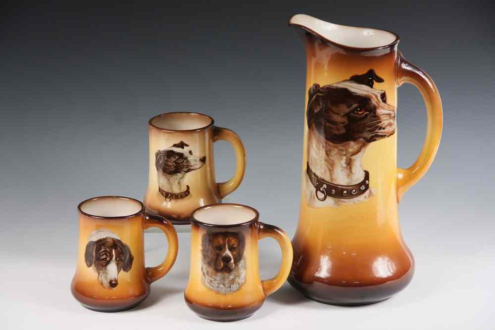 Appraisal: POTTERY CIDER SET - Cider Pitcher Three Mugs decorated with