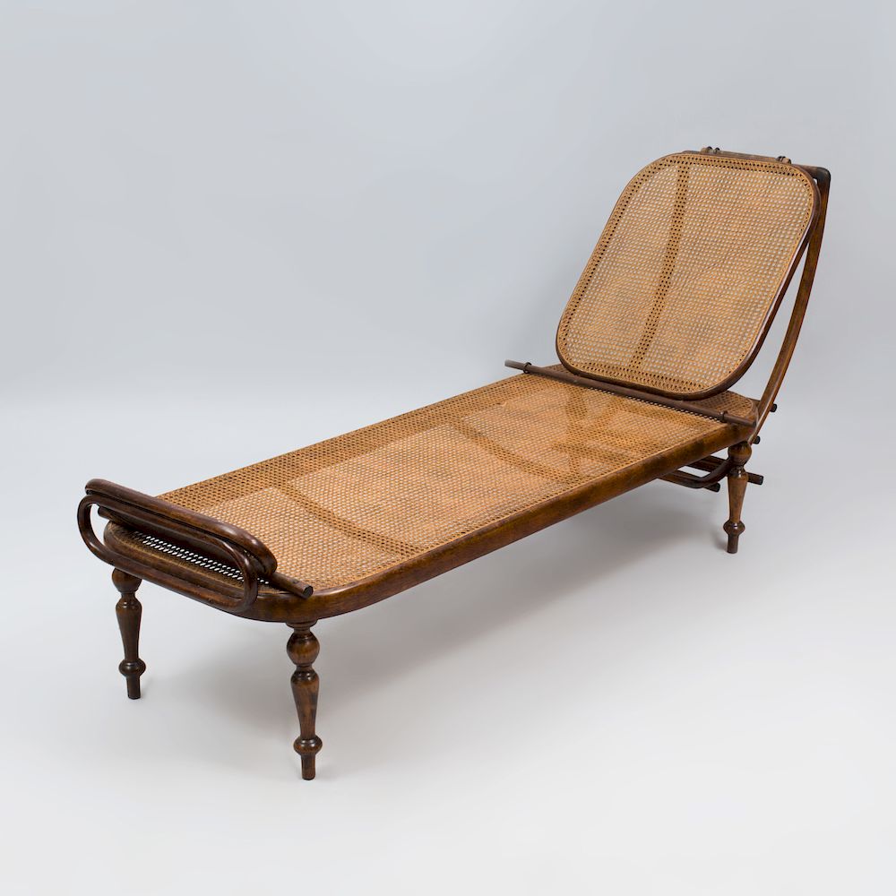 Appraisal: Thonet Bentwood Oak and Caned Chaise Lounge With stamp and