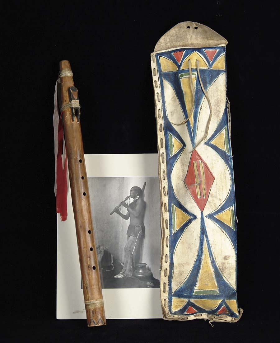 Appraisal: LATE TH CENTURY SIOUX FLUTE WITH PAINTED PARFLECHE CASE AND