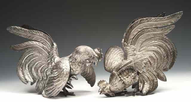 Appraisal: TWO SILVER FIGHTING COCKERELS each stamped sterling Camusso made in