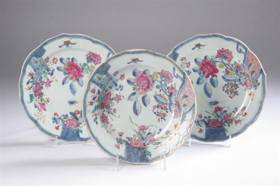 Appraisal: THREE CHINESE FAMILLE ROSE PLATES Qianlong period Floral and brocade