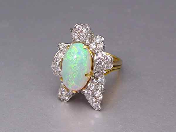 Appraisal: CT YELLOW CRYSTAL OPAL RING WITH CT DIAMONDS K yellow