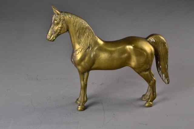 Appraisal: BRASS HORSE STATUEBrass horse statue with decorative molded halter and