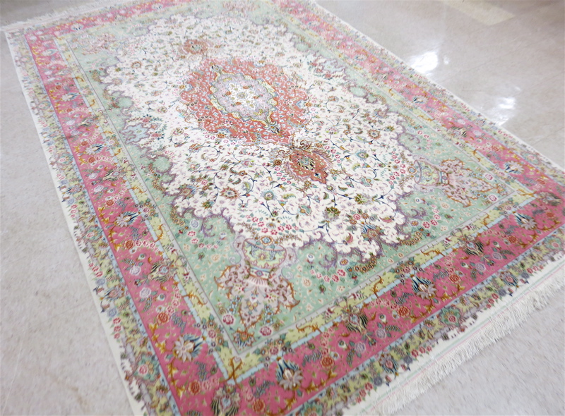 Appraisal: A CONTEMPORARY PERSIAN WOOL AND SILK CARPET floral and central