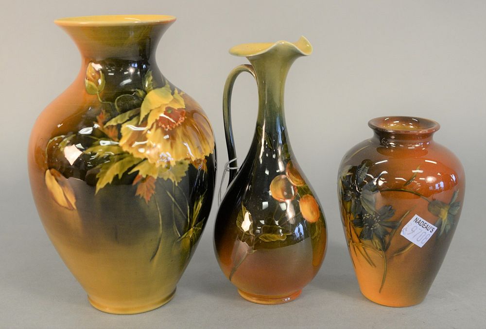 Appraisal: Group of Three Rookwood Pottery Vases with floral motifs and