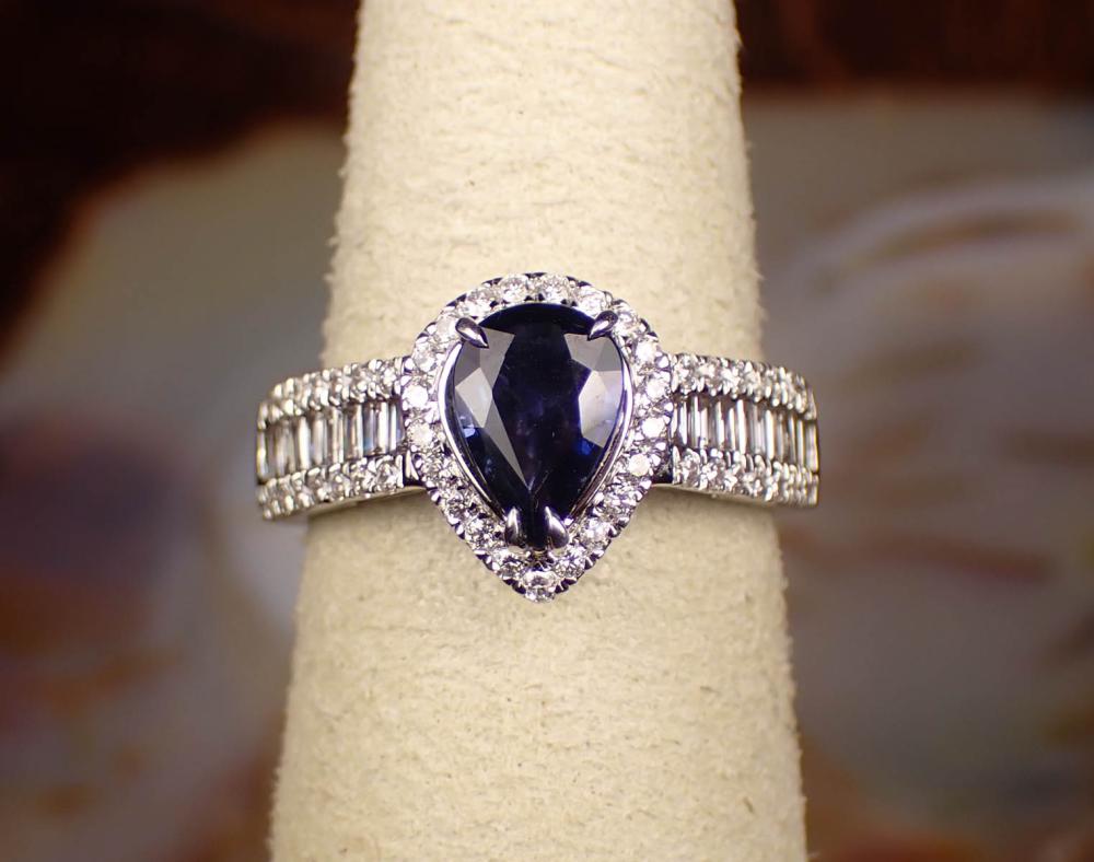 Appraisal: SAPPHIRE DIAMOND AND EIGHTEEN KARAT GOLD RING The white gold