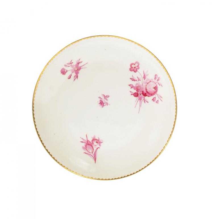 Appraisal: A DERBY SAUCER-DISH painted in carmine pink with flower sprays