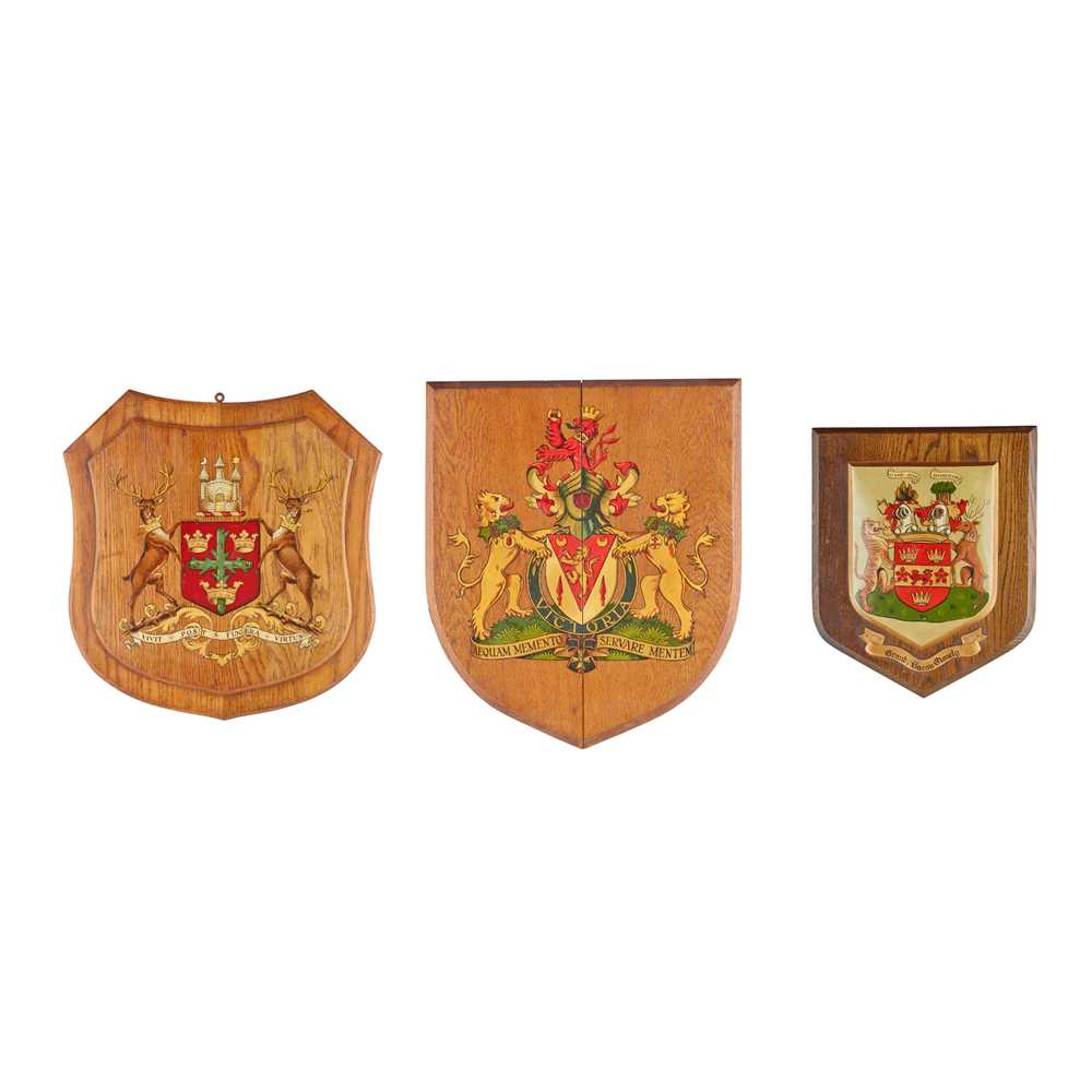 Appraisal: THREE PAINTED OAK COATS-OF-ARMS LATE TH EARLY TH CENTURY the