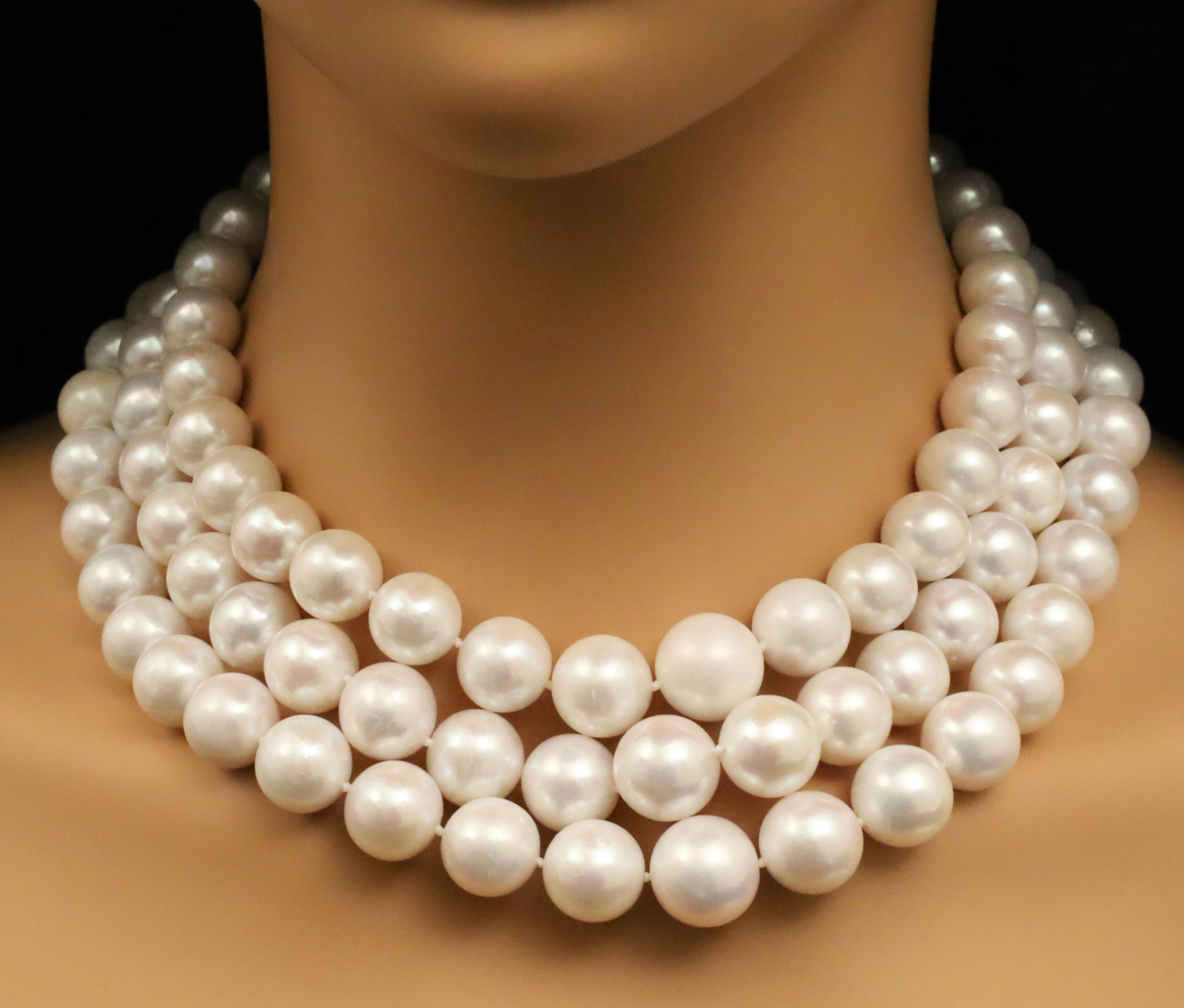 Appraisal: Natural pearl graduating triple strand necklace with white color and