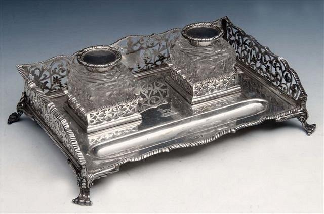 Appraisal: AN EDWARDIAN SILVER DESK STAND with pierced sides decorated with