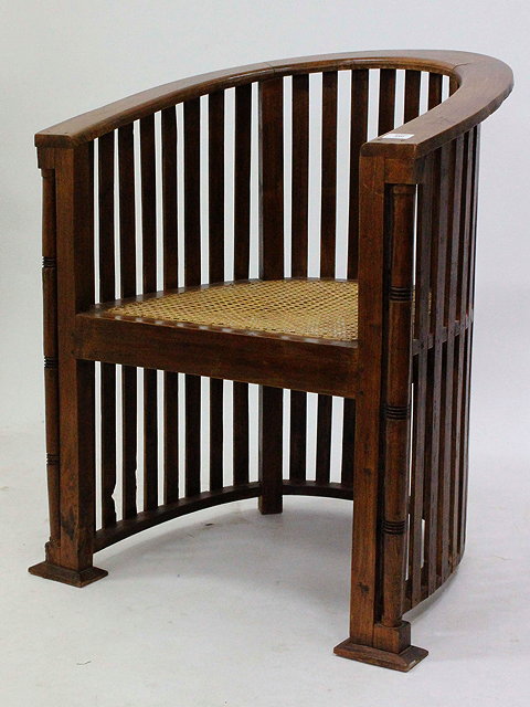 Appraisal: AN ARTS CRAFTS BERGERE CANED TUB CHAIR with a slat