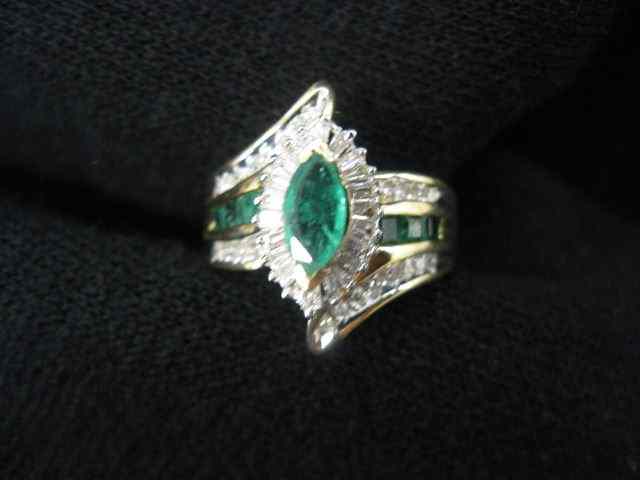 Appraisal: Emerald Diamond Ring marquis center emerald weighing carat with square