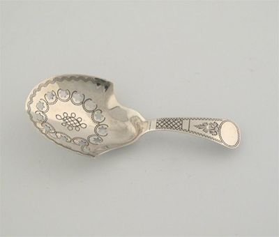 Appraisal: A George III spoon shield shaped bowl with twelve cut-out