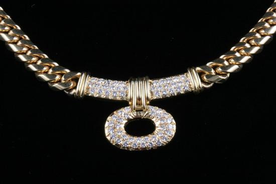 Appraisal: K YELLOW GOLD AND DIAMOND NECKLACE Graduated flattened curb link