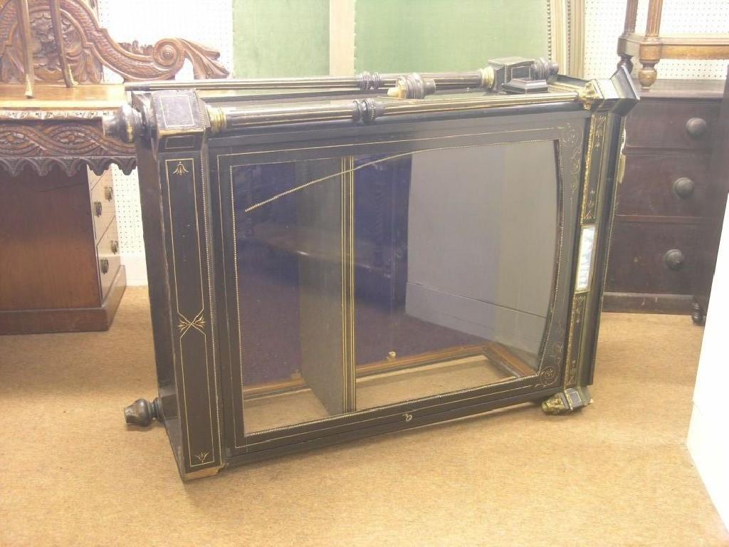 Appraisal: A Victorian ebonised wood and ormolu-mounted display cabinet frieze with