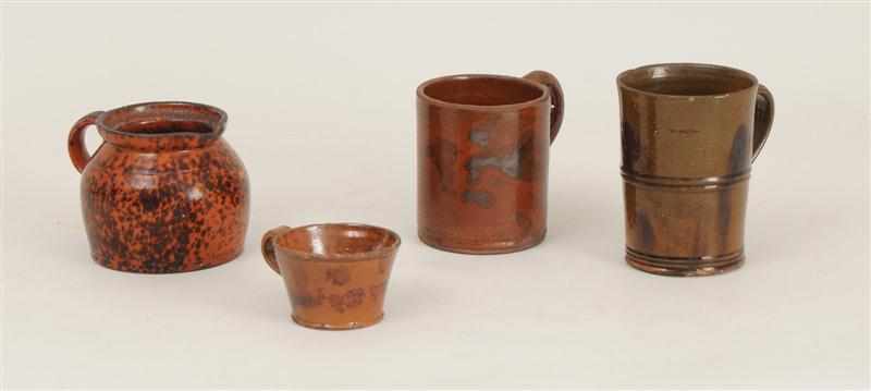 Appraisal: THREE REDWARE MUGS AND A CREAM JUG Comprising one cylinder