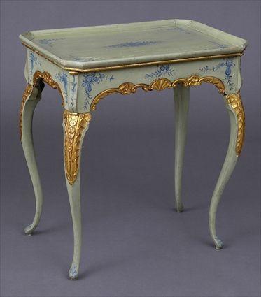 Appraisal: ITALIAN CARVED PAINTED AND PARCEL-GILT TRAY-TOP TABLE The chamfered rectangular