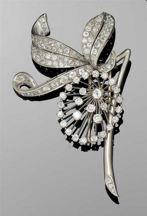 Appraisal: DIAMOND CLIP BROOCH France ca Platinum Fancy brooch in the