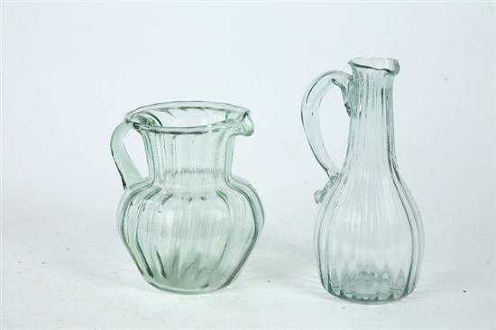 Appraisal: PATTERN MOLDED GLASS CREAMER AND CRUET American st half- th