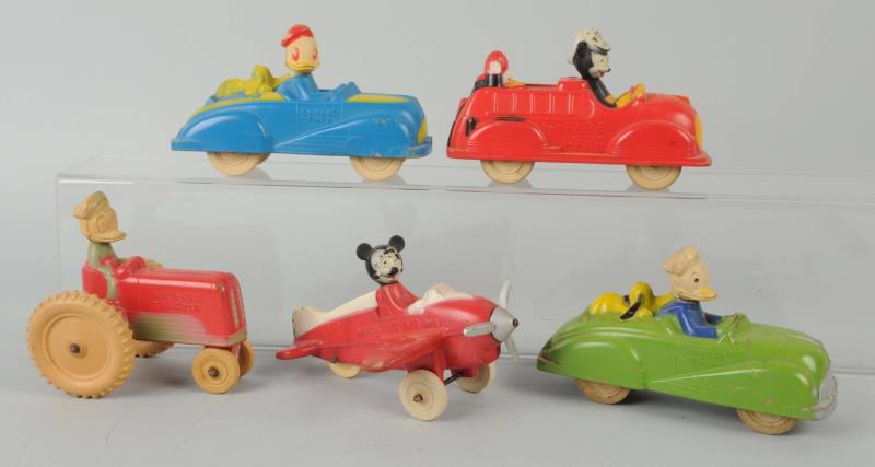 Appraisal: Lot Of Walt Disney Sun Rubber Vehicles Included in this