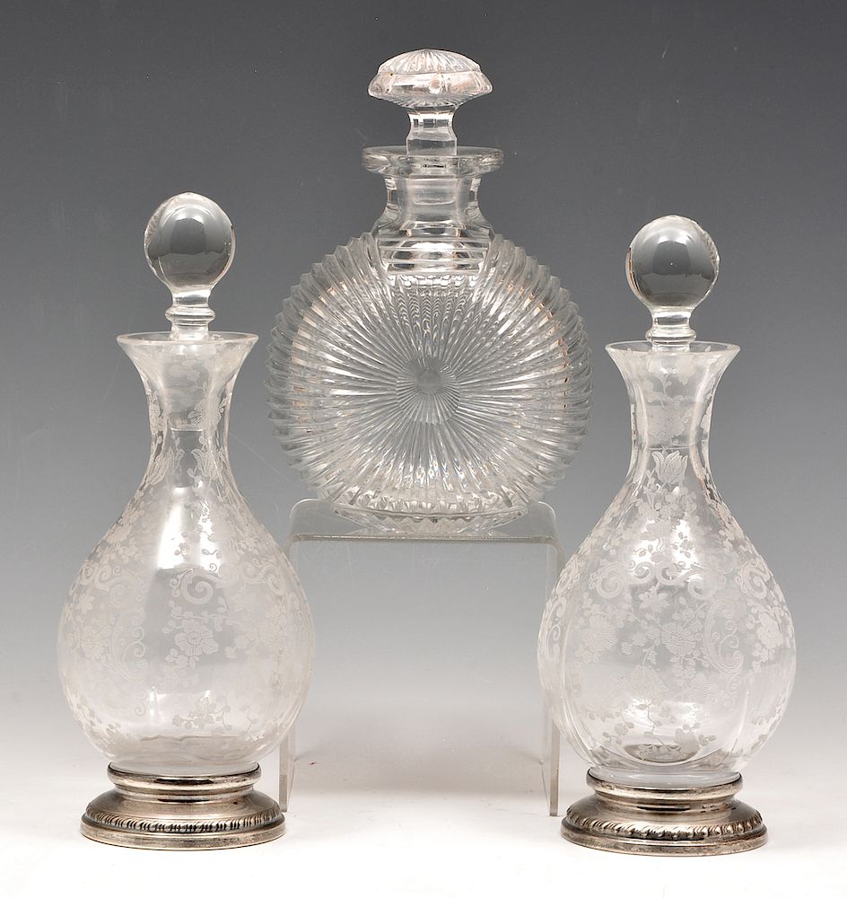 Appraisal: Three crystal decanters Three crystal decanters The single in a