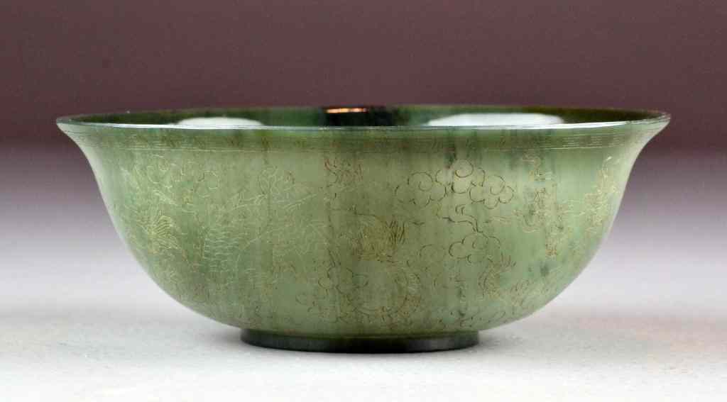 Appraisal: Chinese Carved Spinach Jade BowlDelicately thin and finely carved to