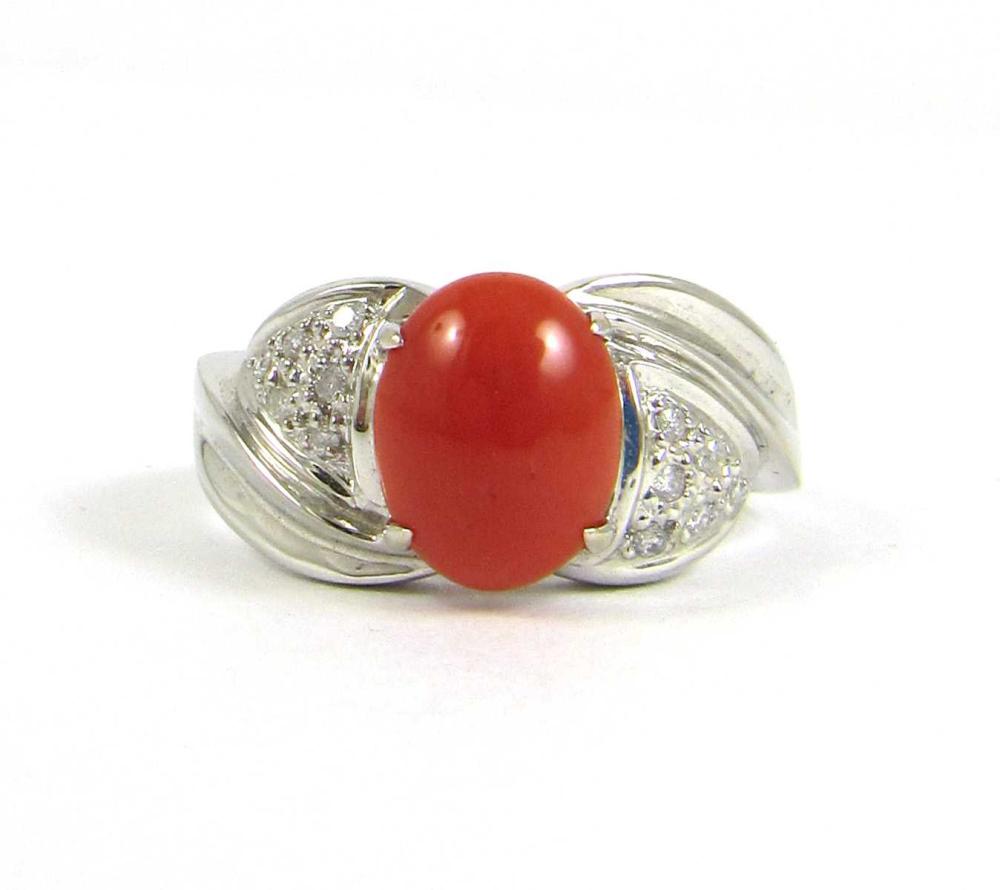 Appraisal: CORAL DIAMOND AND FOURTEEN KARAT WHITE GOLD RING with six