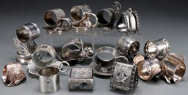 Appraisal: A GROUP OF SILVER PLATE FIGURAL NAPKIN RINGS A GROUP