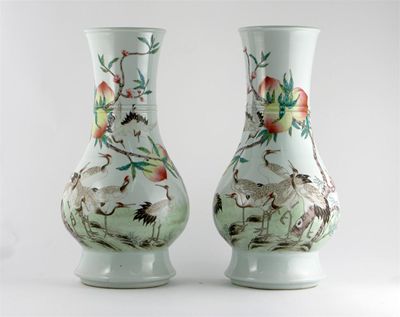 Appraisal: A pair of Chinese famille rose vases painted with eight