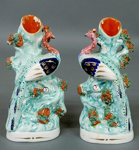 Appraisal: Pair of Staffordshire peacock spill vases late th c see