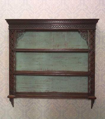 Appraisal: A George III oak set of hanging shelves the moulded