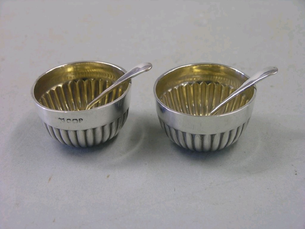 Appraisal: A pair of late Victorian silver salts circular reeded shape