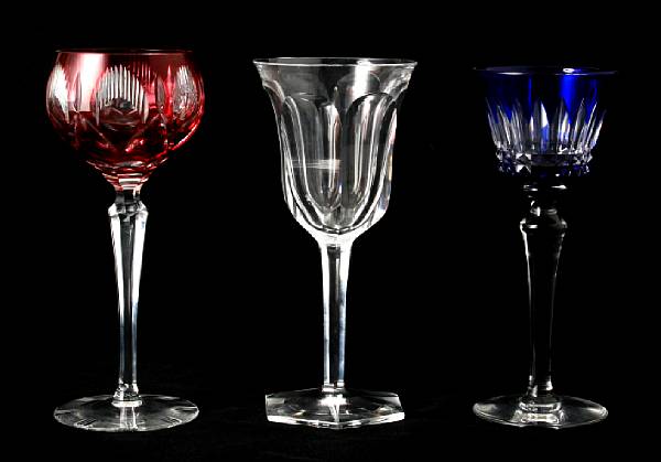 Appraisal: A set of fourteen Baccarat cased glass goblets and twenty