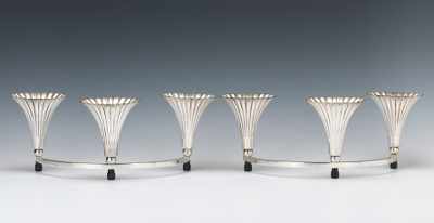 Appraisal: A Pair of Silvered Flower Form Candle Stands th Century