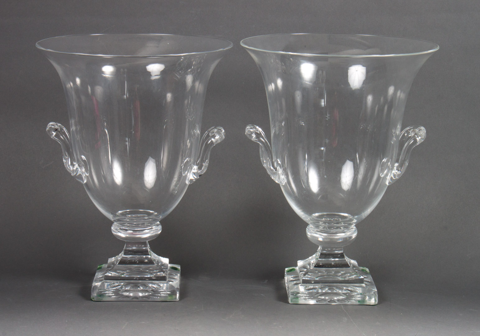 Appraisal: Pair of Steuben glass urns with applied double handles in