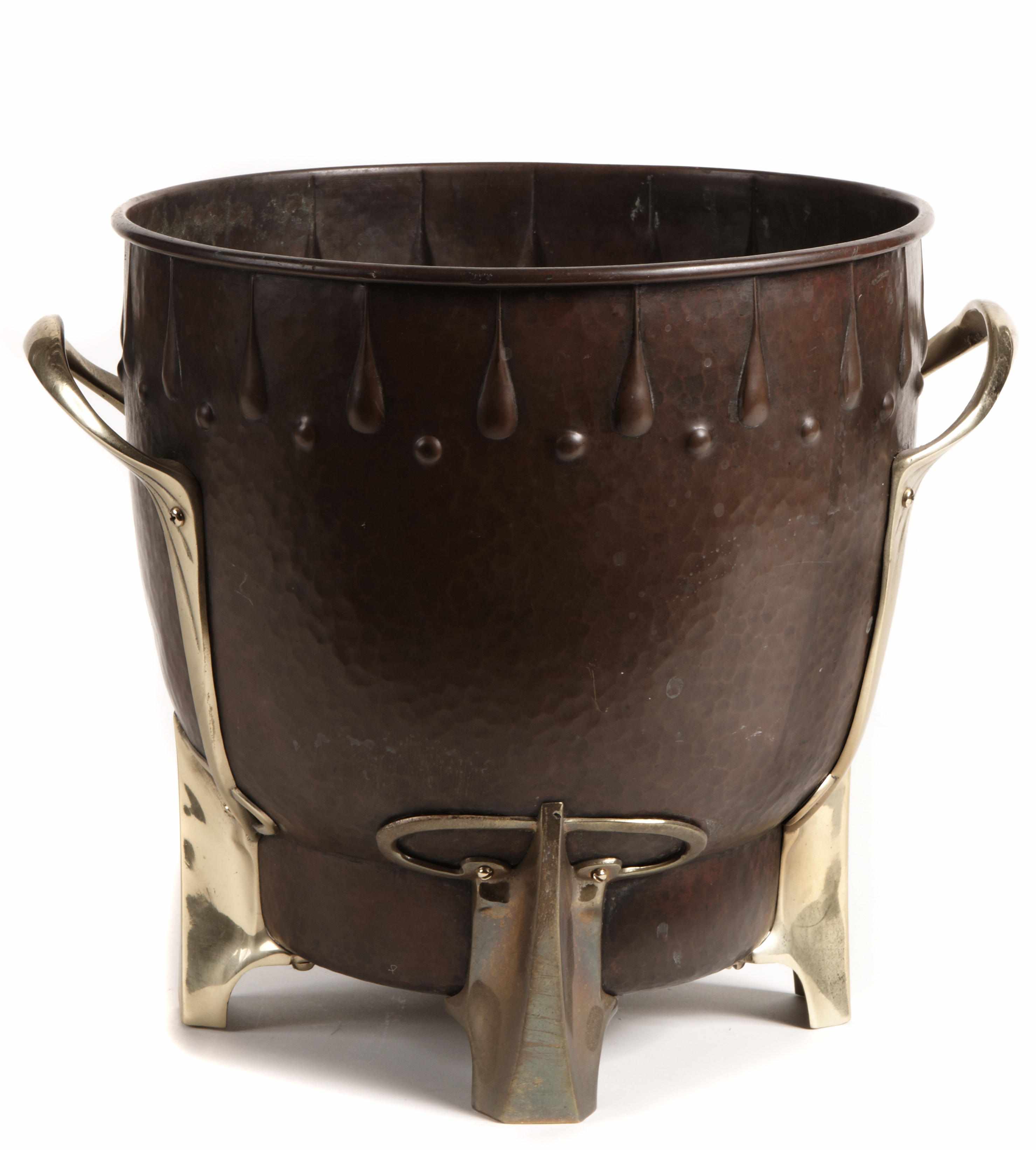 Appraisal: A copper and brass two handled jardiniere height in