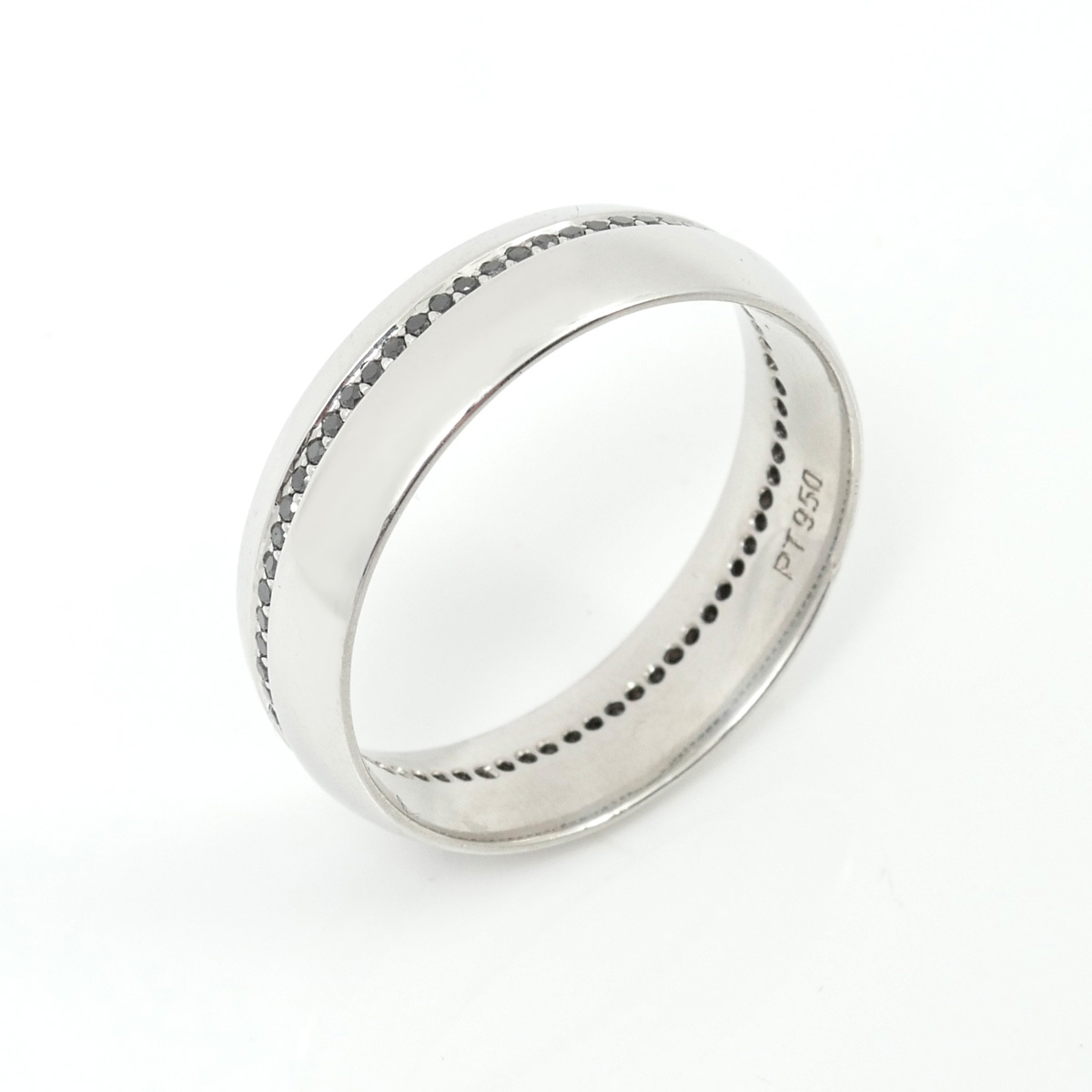 Appraisal: PLATINUM BAND WITH BLACK DIAMONDS Platinum semi dome band is