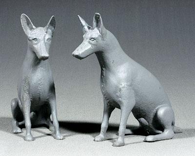 Appraisal: Pair cast iron dogs each seated with perked ears gray