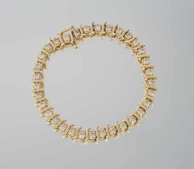 Appraisal: A Ladies' Diamond Tennis Bracelet k yellow gold tennis bracelet