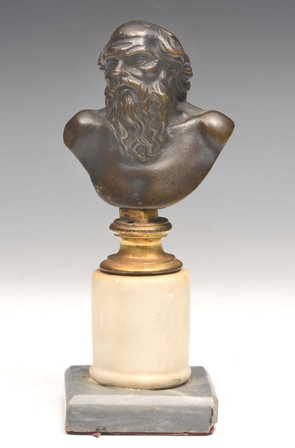 Appraisal: A BRONZE BUST of the head and shoulders of a