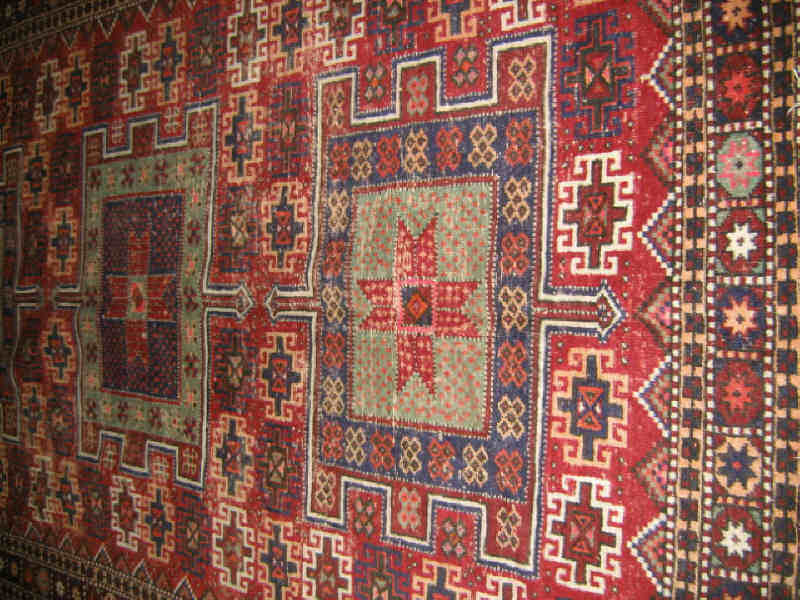 Appraisal: ARDEBIL AREA RUG The red field of latch hook medallions