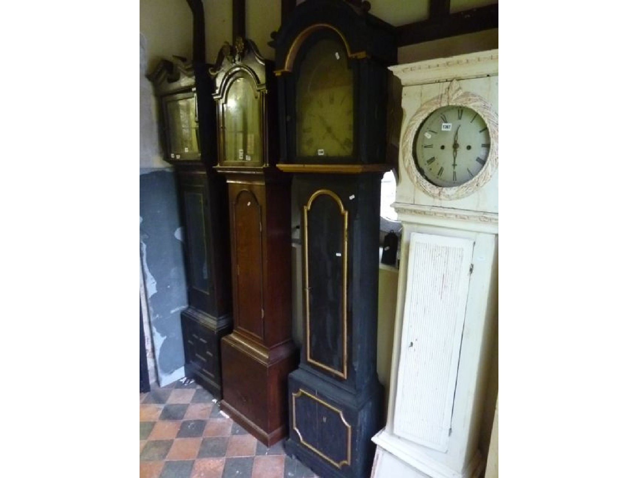 Appraisal: A th century long case clock enclosing a broken arch