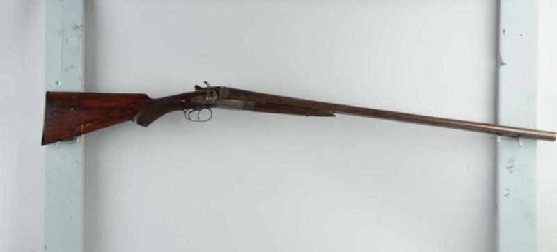 Appraisal: William Moore Co Double Barrel Shotgun Description GA Marked Wm