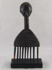 Appraisal: A Fang tribe comb Gabon on stand x cm