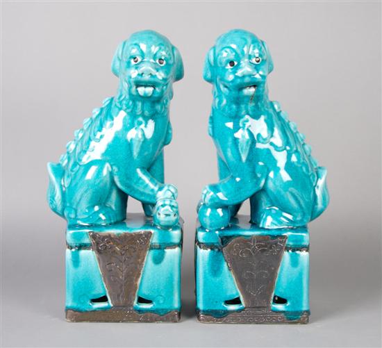 Appraisal: A Pair of Ceramic Chinese Fu Dogs Height inches