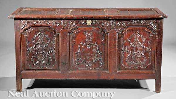 Appraisal: An English Carved Oak Blanket Chest th c paneled molded